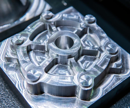 Detailed close-up of a precision-machined metal component showcasing intricate design and fine craftsmanship.