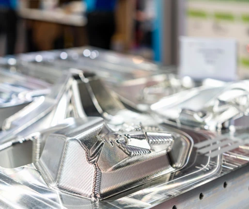 Detailed close-up of precision-machined metal components showcasing intricate designs and high-quality craftsmanship.